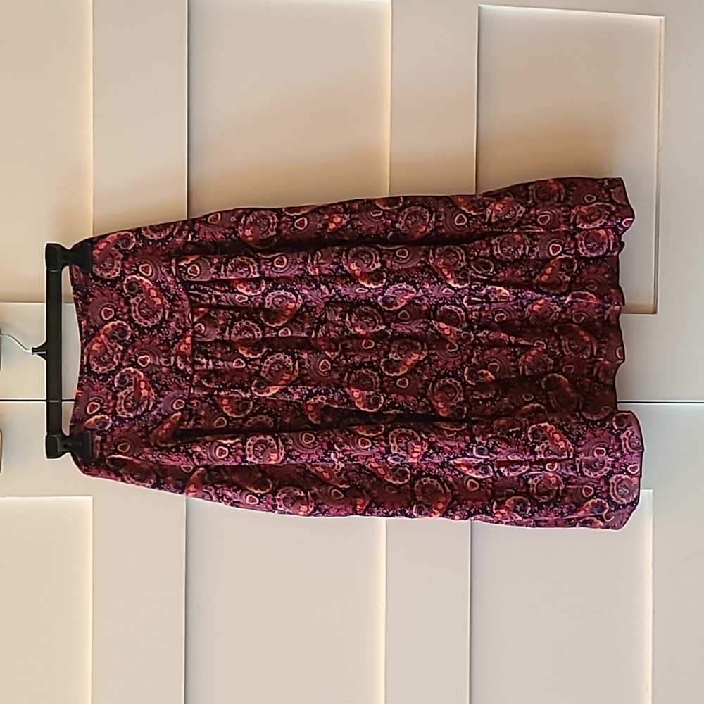 Tiered paisley skirt with flat-front smock-back waist.